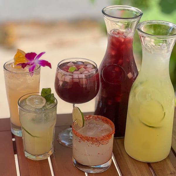 Guardado's Restaurant Spanish drinks: two pitchers and four glasses of sangria, margaritas, and mojitos.